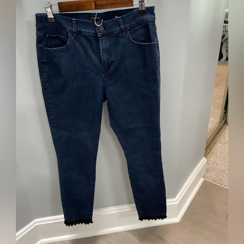 Ann Taylor skinny ankle jeans. Black crochet trim at hem. Excellent condition.